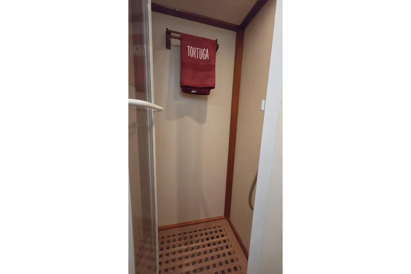 Slide: The Image of Shower area in 2003 Grand Banks 49 Eastbay HX yacht with towel rack. - 38