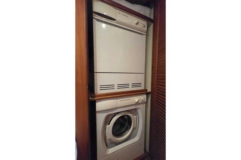 Slide: The Image of Stacked washer and dryer in 2003 Grand Banks 49 Eastbay HX yacht. - 41