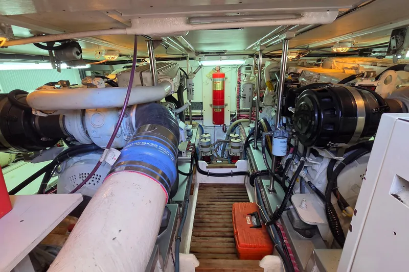 Slide: The Image of Engine room of 2003 Grand Banks 49 Eastbay HX with visible machinery and equipment. - 45