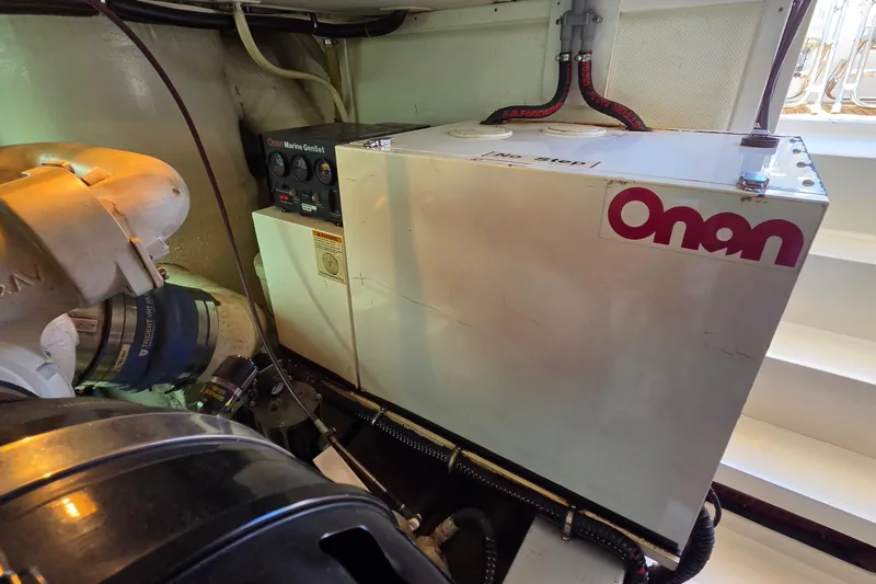 Slide: The Image of Onan Marine GenSet in 2003 Grand Banks 49 Eastbay HX engine room. - 47