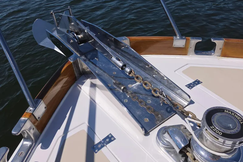 Slide: The Image of Anchor and chain mechanism on 2003 Grand Banks 49 Eastbay HX yacht deck. - 6