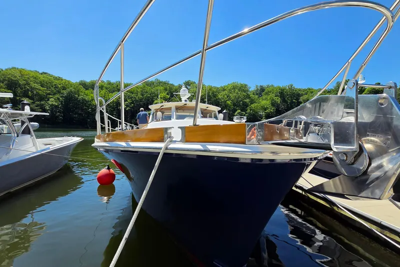 Slide: The Image of 2003 Grand Banks 49 Eastbay HX yacht docked on a sunny day. - 7