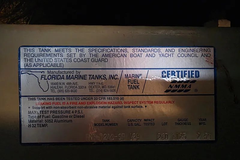 Slide: The Image of Label on a 1994 Sea Ray 370 Express Cruiser marine fuel tank, certified by NMMA. - 38