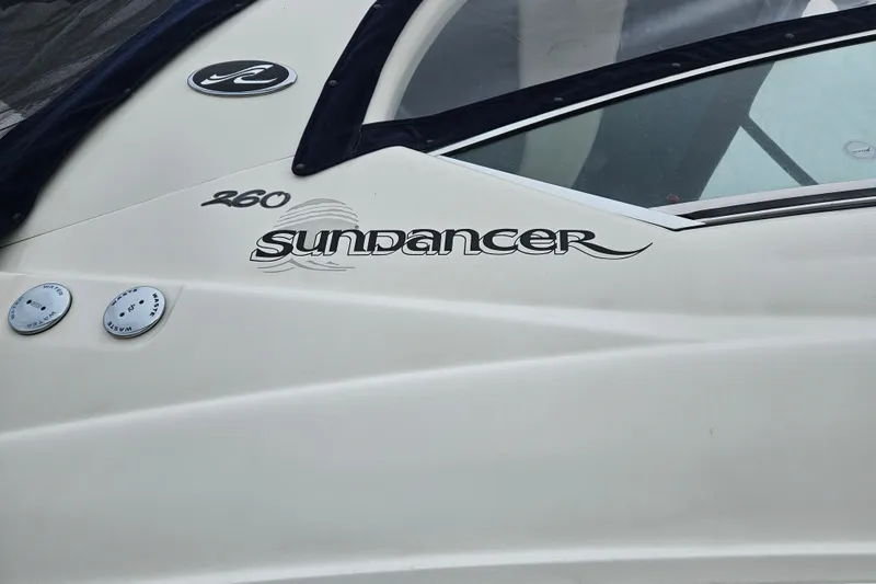 Slide: The Image of Close-up of 2007 Sea Ray 270 Sundancer boat logo and design details. - 3