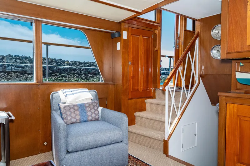 Slide: The Image of Interior of 1971 Burger 64 Pilothouse Motoryacht with stairs and armchair. - 34