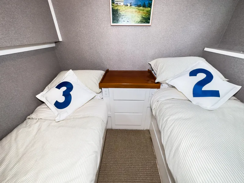 Slide: The Image of Twin beds in a 1971 Burger 64 Pilothouse Motoryacht cabin. - 44