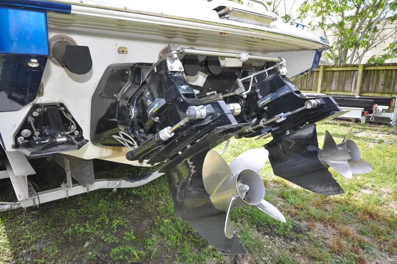 Slide: The Image of 2006 Formula 382 FASTech boat with dual propellers and outboard motors. - 18