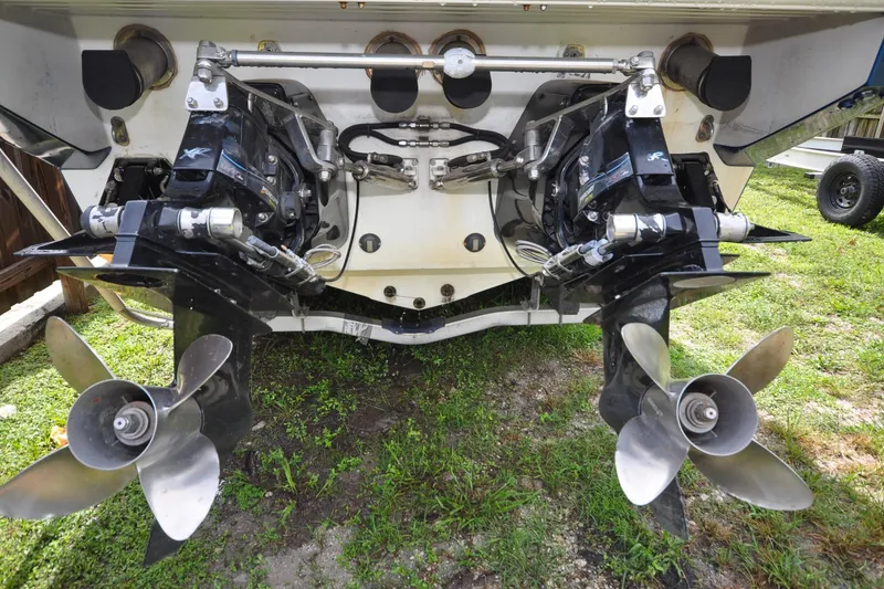 Slide: The Image of Rear view of 2006 Formula 382 FASTech boat with dual propellers on grass. - 19