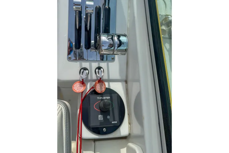 Slide: The Image of 2006 Formula 382 FASTech boat controls with throttle and thruster panel. - 23