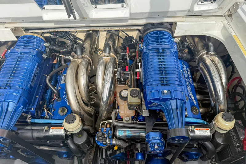Slide: The Image of Twin blue engines in a 2006 Formula 382 FASTech boat. - 31