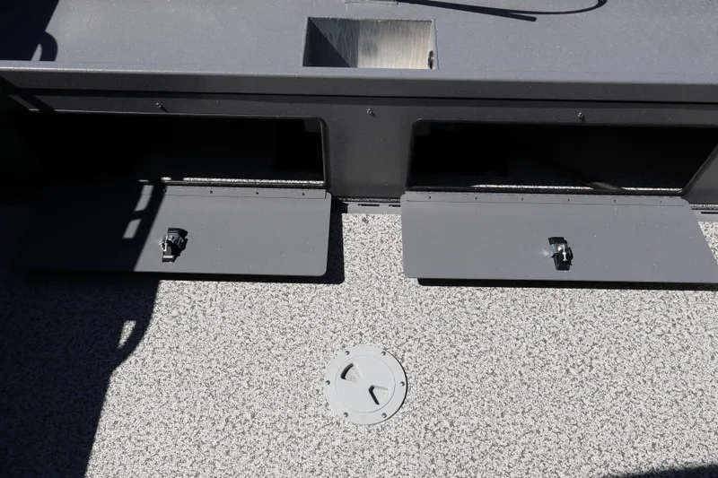 Slide: The Image of 2026 Alumaweld Talon 18 boat storage compartments and deck detail. - 10