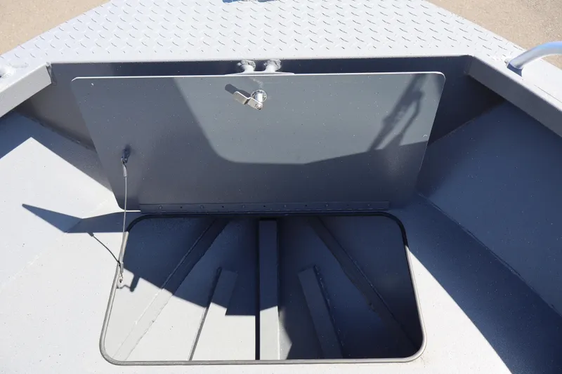 Slide: The Image of Storage compartment on 2026 Alumaweld Talon 18 boat, featuring a secure latch and durable design. - 22