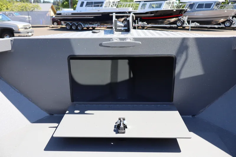 Slide: The Image of 2026 Alumaweld Talon 18 boat storage compartment with open hatch, showcasing interior space. - 23