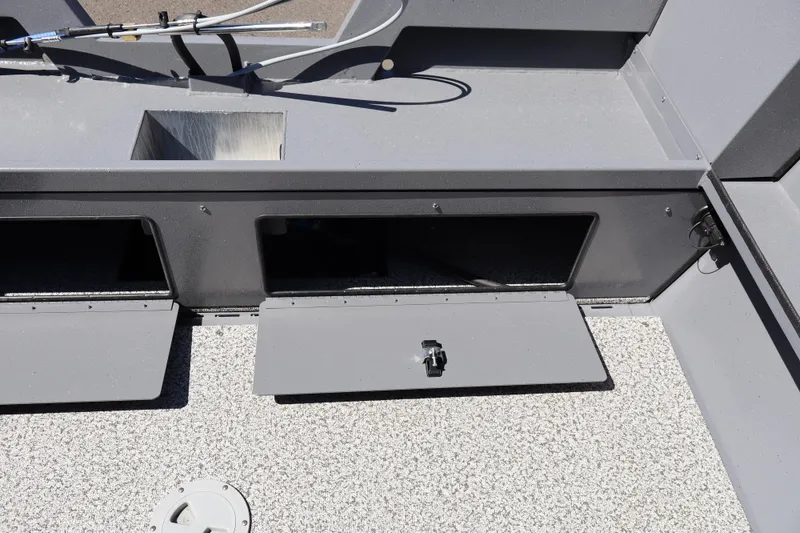 Slide: The Image of Interior view of 2026 Alumaweld Talon 18 boat storage compartments. - 9