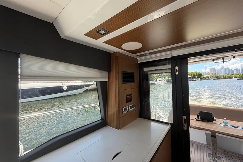 Slide: The Image of Interior view of 2022 Sealine C430 yacht with scenic waterway backdrop. - 103