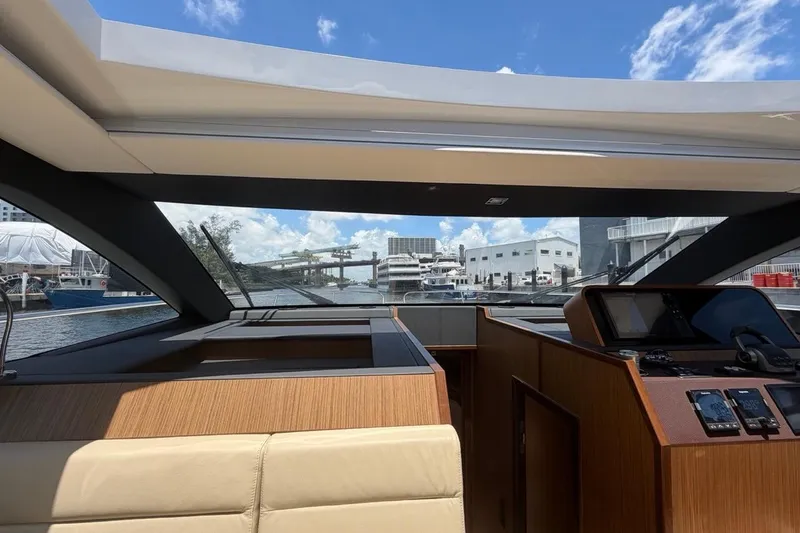 Slide: The Image of Interior view of 2022 Sealine C430 yacht, showcasing helm and panoramic windows. - 107