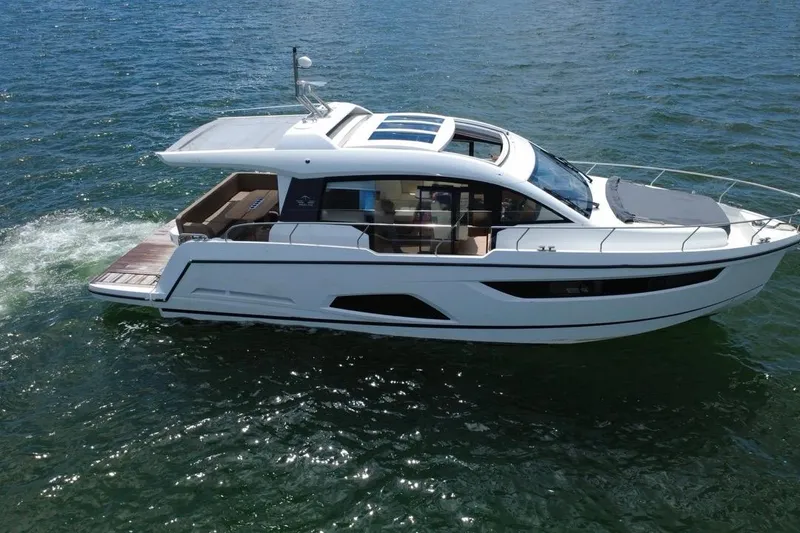 Slide: The Image of 2022 Sealine C430 yacht cruising on open water, showcasing sleek design and luxury features. - 2