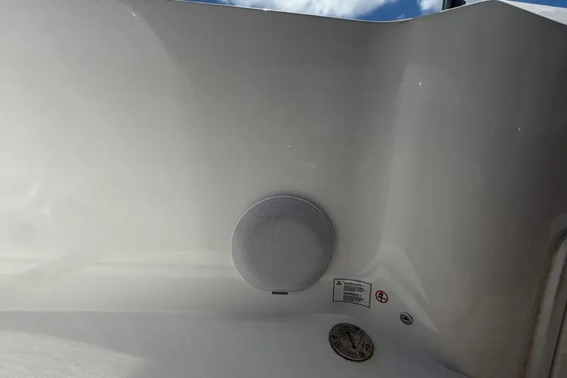 Slide: The Image of Speaker and warning label on 2022 Sealine C430 yacht interior. - 29