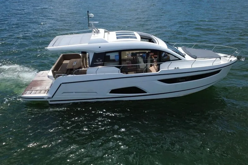 Slide: The Image of 2022 Sealine C430 yacht cruising on open water, showcasing sleek design and luxury features. - 3
