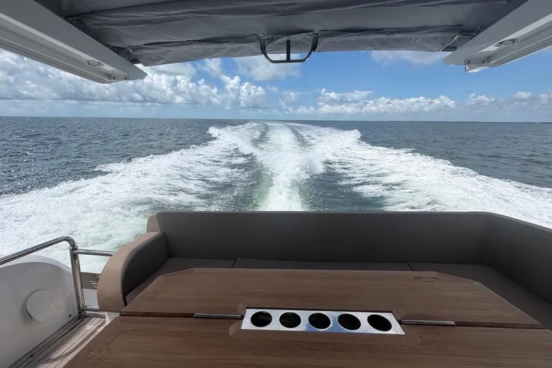 Slide: The Image of View from the 2022 Sealine C430 yacht, showcasing ocean waves and a sunny sky. - 36