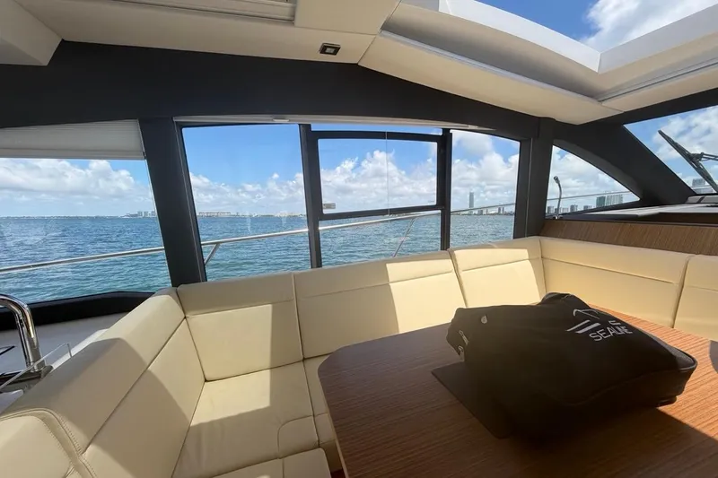 Slide: The Image of Interior of 2022 Sealine C430 yacht with ocean view through large windows. - 52