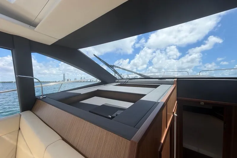 Slide: The Image of Interior view of 2022 Sealine C430 yacht with modern design and ocean backdrop. - 56