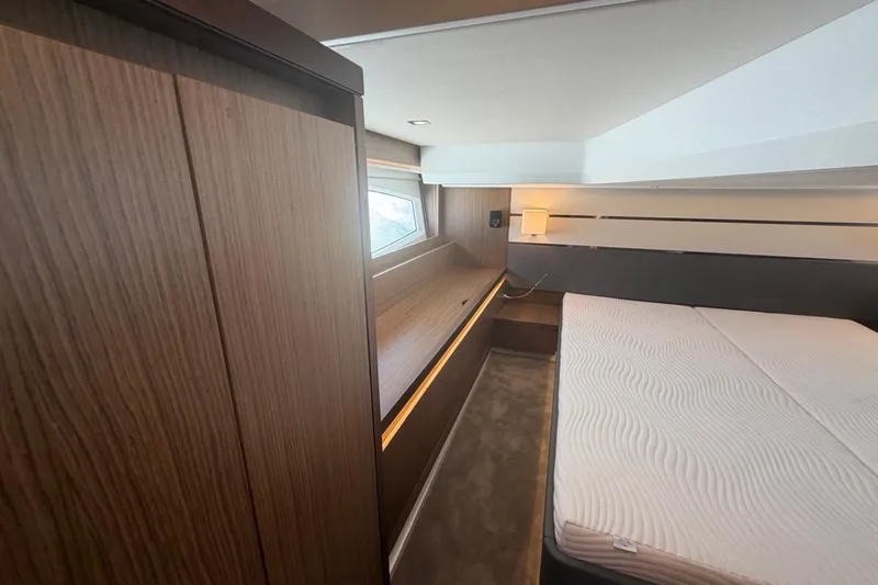 Slide: The Image of Luxurious cabin interior of 2022 Sealine C430 yacht with modern wood finishes. - 67