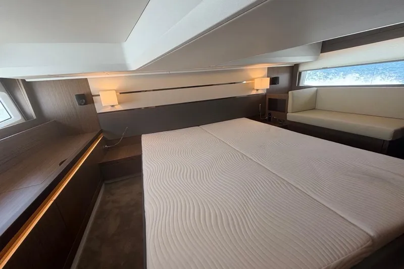 Slide: The Image of Luxurious bedroom interior of 2022 Sealine C430 yacht with modern design and ambient lighting. - 68
