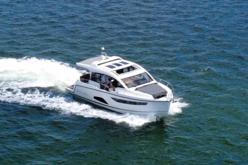 Slide: The Image of 2022 Sealine C430 yacht cruising on open water, showcasing sleek design and luxury features. - 7