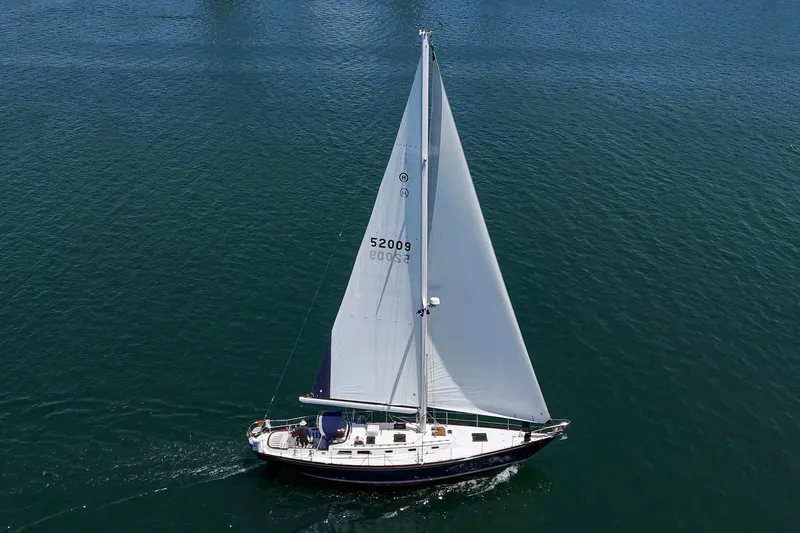 Slide: The Image of Sailing yacht Hinckley Sou'wester 52 from 1998 gliding on open water. - 10