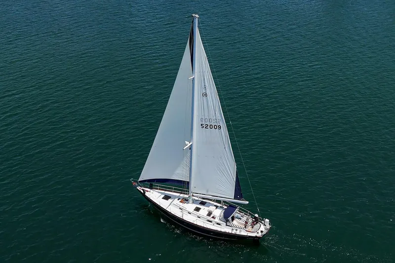 Slide: The Image of Sailing yacht Hinckley Sou'wester 52, 1998 model, cruising on open water. - 13