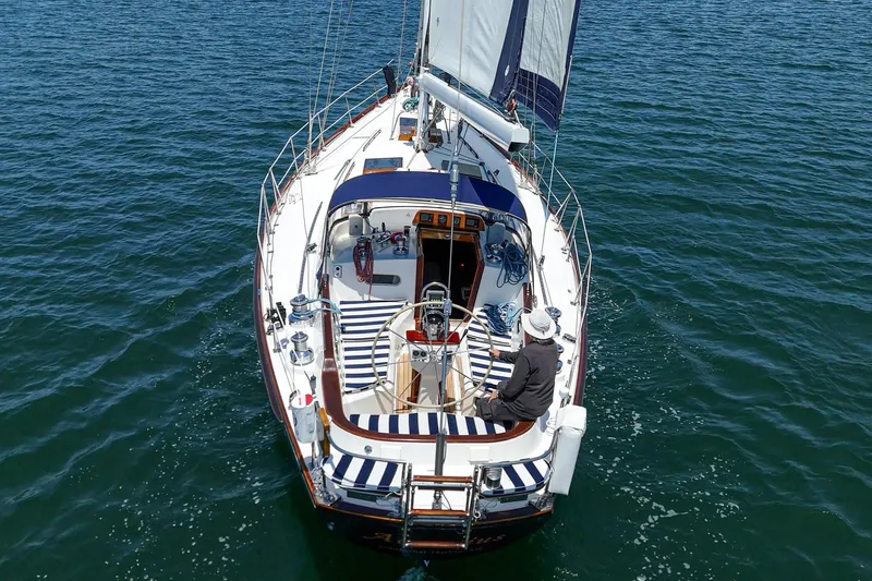 Slide: The Image of Sailing on a 1998 Hinckley Sou'wester 52 yacht in open water. - 14