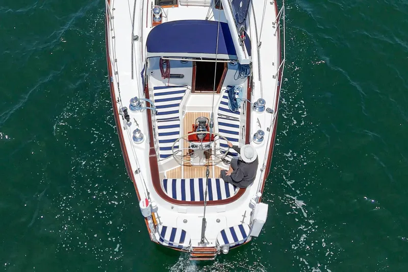 Slide: The Image of Overhead view of 1998 Hinckley Sou'wester 52 sailboat on open water. - 17