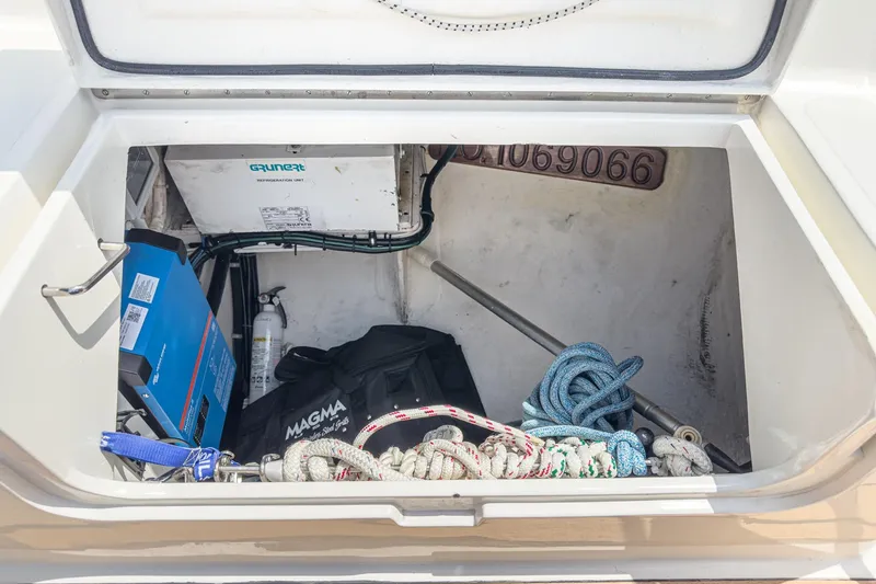 Slide: The Image of Storage compartment of 1998 Hinckley Sou'wester 52 with ropes and equipment. - 23