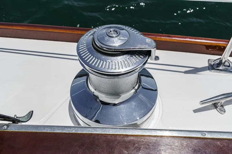 Slide: The Image of Chrome winch on 1998 Hinckley Sou'wester 52 yacht deck, glistening in sunlight. - 34