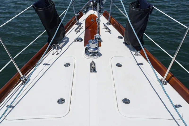 Slide: The Image of Deck of 1998 Hinckley Sou'wester 52 sailboat with winch and ropes. - 39