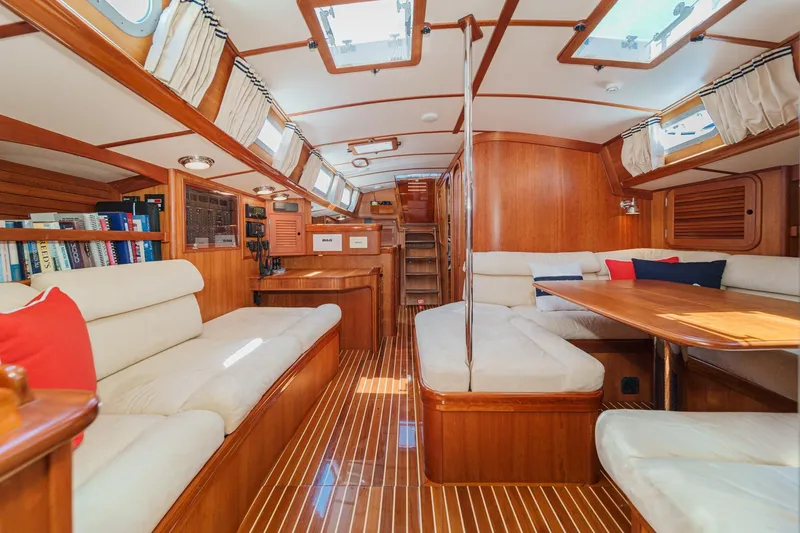 Slide: The Image of Luxurious interior of a 1998 Hinckley Sou'wester 52 yacht with elegant wood finishes. - 53