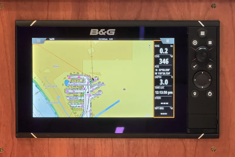Slide: The Image of B&G navigation display on 1998 Hinckley Sou'wester 52 yacht, showing map and coordinates. - 61
