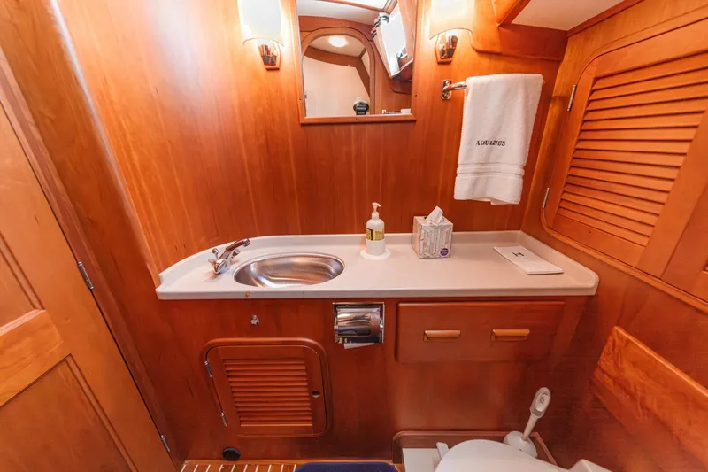 Slide: The Image of Luxurious wooden bathroom interior of 1998 Hinckley Sou'wester 52 yacht. - 69