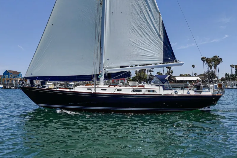 Slide: The Image of Sailing yacht Hinckley Sou'wester 52, 1998 model, cruising on calm waters. - 7