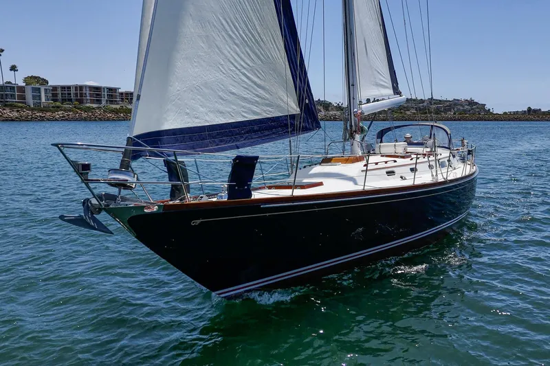 Slide: The Image of Sailing yacht Hinckley Sou'wester 52, 1998 model, cruising on calm waters. - 8