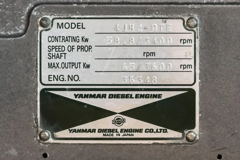 Slide: The Image of Yanmar diesel engine plate on 1998 Hinckley Sou'wester 52, model 4JH2-DTE, 65 kW output. - 80