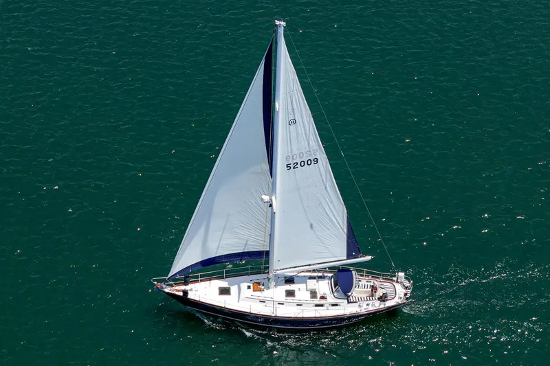 Slide: The Image of Sailing yacht Hinckley Sou'wester 52 from 1998 gliding on open water. - 9