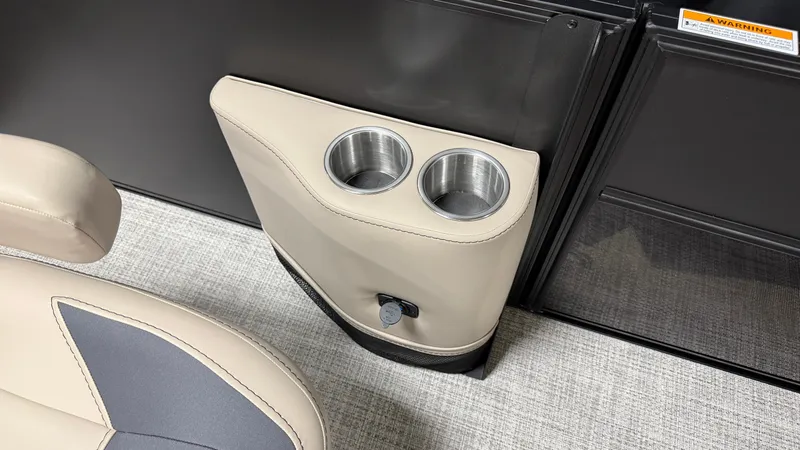 Slide: The Image of Beige boat seat armrest with two stainless steel cup holders and a USB port. - 33