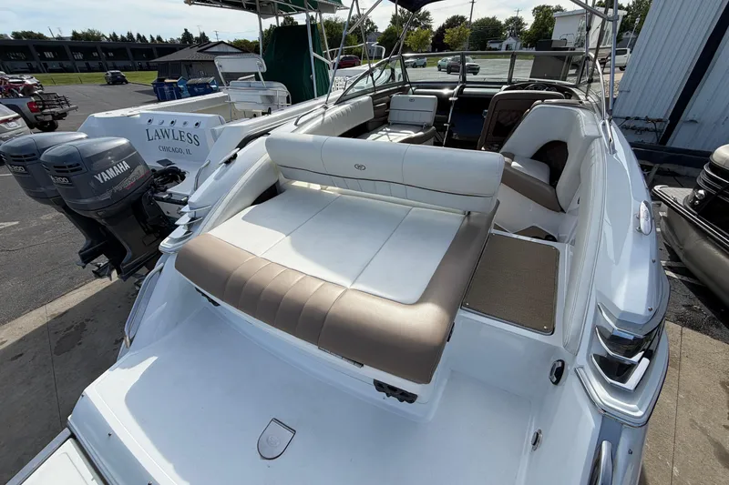 Slide: The Image of 2013 Cobalt 273 boat with Yamaha engines, featuring spacious seating and sleek design. - 4