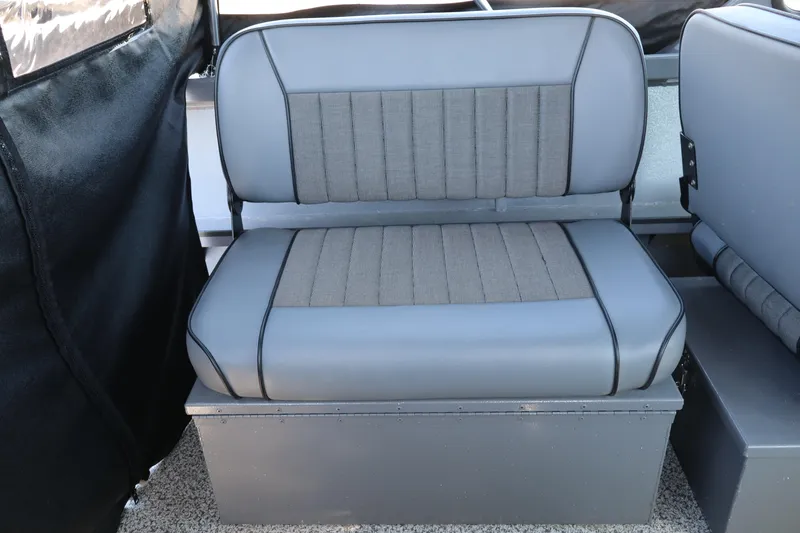 Slide: The Image of 2026 Alumaweld Talon 18 boat seat with gray upholstery and storage compartment. - 14