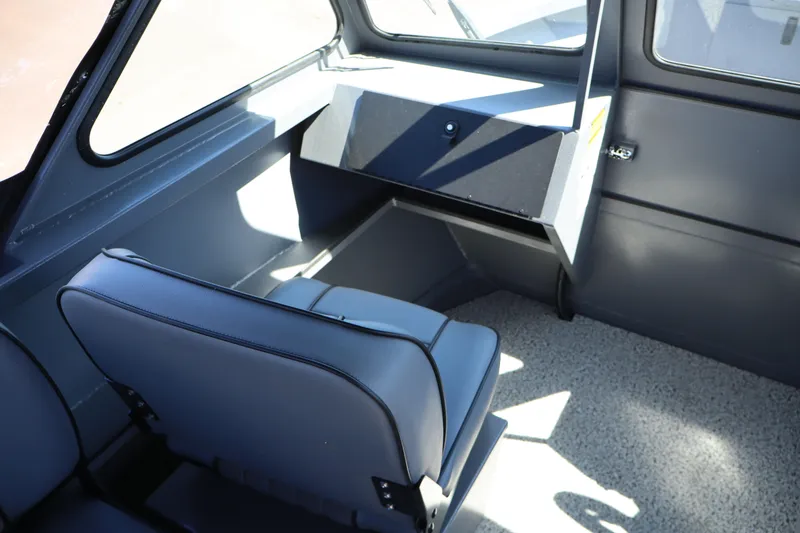 Slide: The Image of Interior of 2026 Alumaweld Talon 18 boat, featuring seating and storage area. - 15