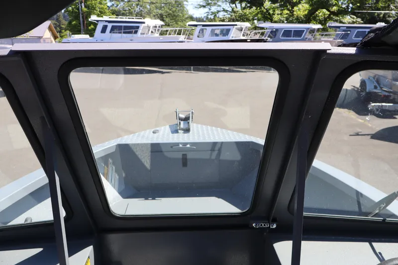 Slide: The Image of Interior view of 2026 Alumaweld Talon 18 boat, showcasing the bow through the windshield. - 22