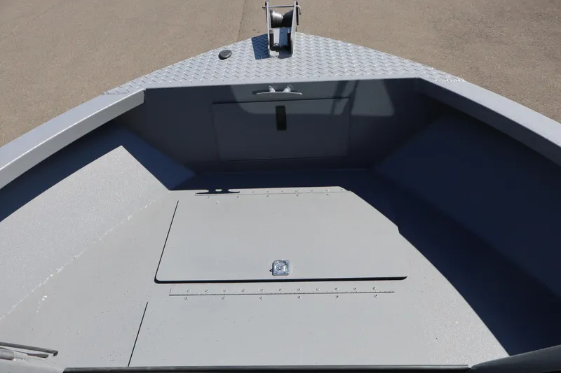 Slide: The Image of 2026 Alumaweld Talon 18 boat bow with storage compartment and anchor mount. - 23