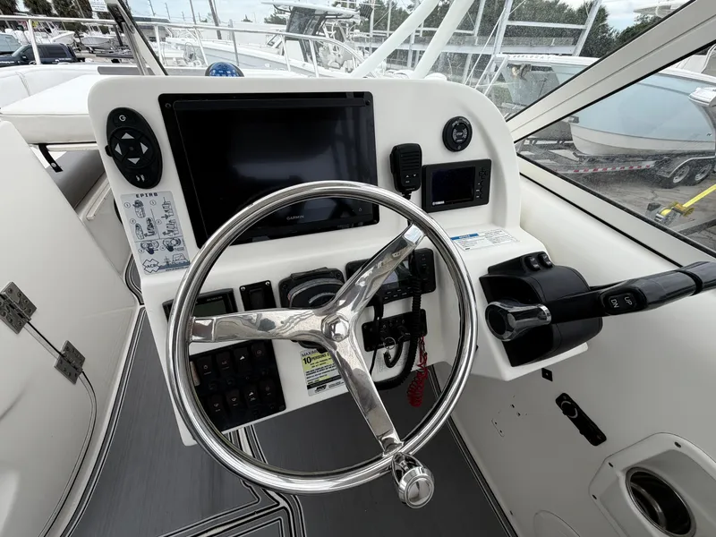 Slide: The Image of Helm console of a 2018 World Cat 255 DC boat with navigation system. - 6